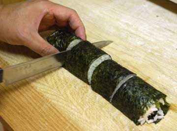 Cut sushi roll again into 4