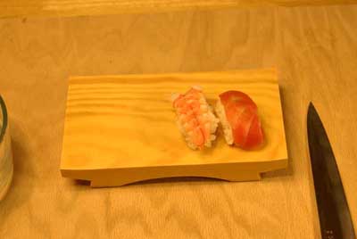 Nigiri zushi on wood platter 
