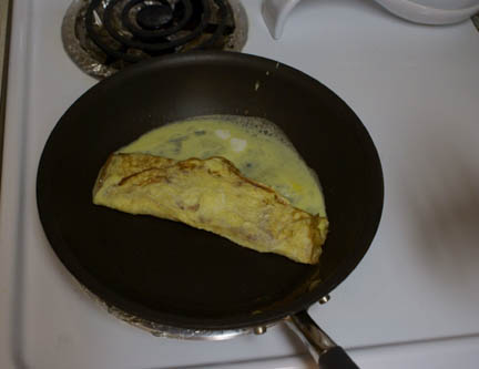 Egg in pan 5